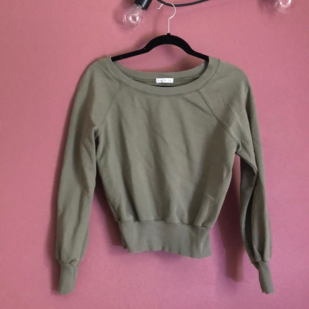 green sweater